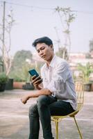 Man displaying strange content on his smartphone, looking perplexed. photo