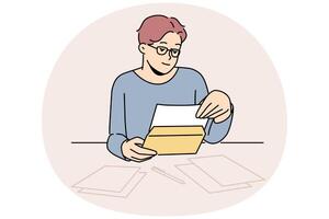 Man in glasses reading letter at table vector