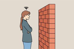Woman stands near brick barrier, as concept of insurmountable obstacle when trying to solve problems vector