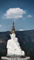 The big white Buddha five statue,Phetchabun is one of the top Thailand famous temples with a huge five white jade buddhas layered statue,Wat Phra That Pha Kaew, Phetchabun,Five white Buddha statue. video