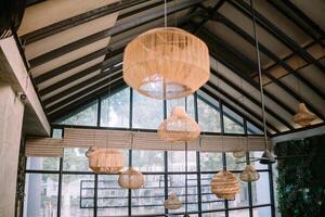 Decorative lights adorning the wall of a restaurant building, casting a warm and inviting glow, creating a cozy ambiance for diners photo