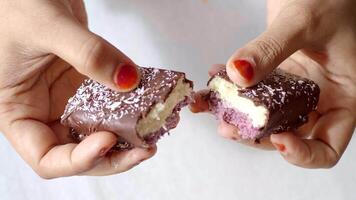 top view of hand cracking a coconut and chocolate protein bars video