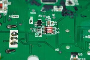 a close up of a circuit board with many different components photo