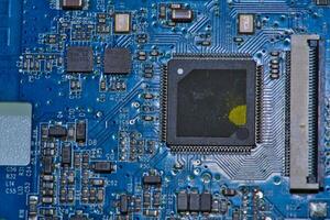a close up of a computer motherboard photo
