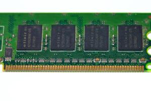 a close up of a memory module with four memory chips photo