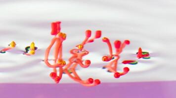 Botany concept, close up of long red and yellow pistils and stamens. Stock footage. Details of an unusual flower underwater. video