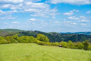 summer mountains green grass and blue sky landscape. Czech photo