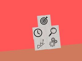 The rise in sales volume is a key factor in achieving business success. This is represented by the flipping cube with the icon goal and the symbol of an upward trend. photo