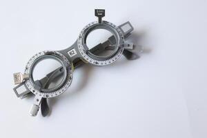 Glasses on chart in optical store photo