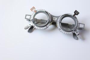 Glasses on chart in optical store photo