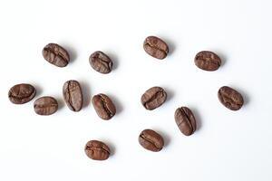 Bean isolated on white, brown roasted coffee beans on white photo
