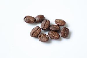 Bean isolated on white, brown roasted coffee beans on white photo