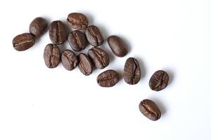 Bean isolated on white, brown roasted coffee beans on white photo