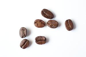 Bean isolated on white, brown roasted coffee beans on white photo