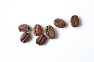 Bean isolated on white, brown roasted coffee beans on white photo