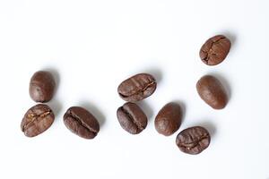Bean isolated on white, brown roasted coffee beans on white photo
