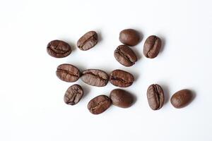 Bean isolated on white, brown roasted coffee beans on white photo