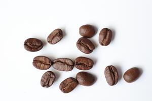 Bean isolated on white, brown roasted coffee beans on white photo