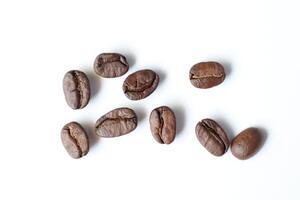 Bean isolated on white, brown roasted coffee beans on white photo