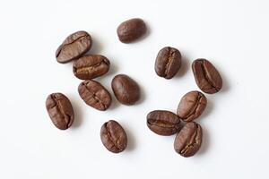 Bean isolated on white, brown roasted coffee beans on white photo