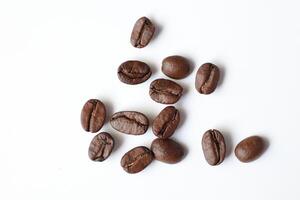 Bean isolated on white, brown roasted coffee beans on white photo