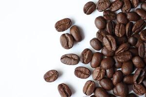Bean isolated on white, brown roasted coffee beans on white photo
