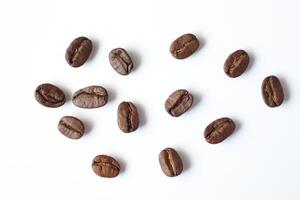 Bean isolated on white, brown roasted coffee beans on white photo