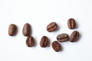 Bean isolated on white, brown roasted coffee beans on white photo