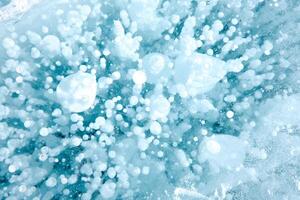 Cracks and bubbles in the ice of Lake Baikal photo