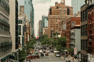 New York, US - May 7, 2023 - Busy street in New York downtown on a sunny day photo
