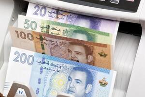 Moroccan dirham in a counting machine photo