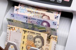 Sierra Leonean leone in a counting machine photo