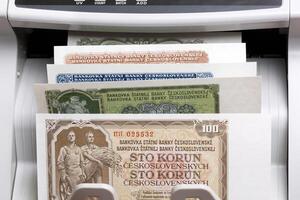 Czechoslovak koruna in a counting machine photo
