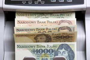 Old Polish money in a counting machine photo