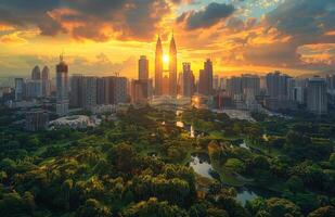 A city skyline and greenery at sunset view from the top. Modern buildings in the city photo