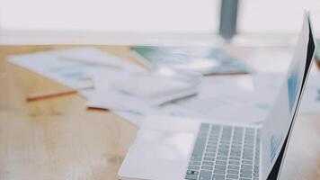 Team of business people are meeting to analyze data for marketing plan,Market research reports and income statistics, Financial and Accounting concept. video
