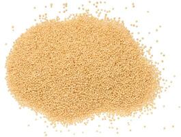 Amaranth seeds scattered on a white isolated background photo