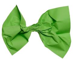 Crumpled green sheet of paper on isolated background photo