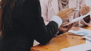 Team of business people are meeting to analyze data for marketing plan,Market research reports and income statistics, Financial and Accounting concept. video