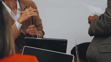 Team of business people are meeting to analyze data for marketing plan,Market research reports and income statistics, Financial and Accounting concept. video