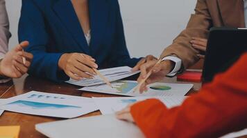 Team of business people are meeting to analyze data for marketing plan,Market research reports and income statistics, Financial and Accounting concept. video
