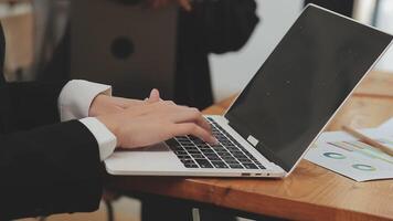 Financial analysts analyze business financial reports on a digital tablet planning investment project during a discussion at a meeting of corporate showing the results of their successful teamwork. video
