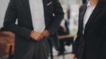 Happy, business people and hands clapping at meeting with notebooks in office for seminar or trade show. Smile, corporate group and conference with applause in boardroom for training interns video