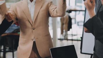 Happy, business people and hands clapping at meeting with notebooks in office for seminar or trade show. Smile, corporate group and conference with applause in boardroom for training interns video