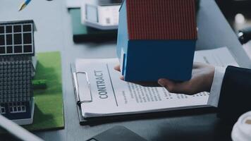 Eco business company meeting with group of business people using laptop to plan strategy and discuss marketing of eco-friendly and clean energy products. Green business company concept. Trailblazing video