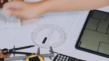 Engineer Teamwork Meeting, Drawing working on blueprint meeting for project working with partner on model building and engineering tools in working site, Construction and structure concept.. video