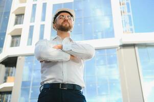 Portrait of an handsome engineer at work photo