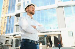 Portrait of an handsome engineer at work photo