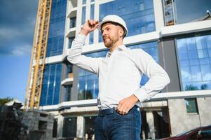 Portrait of an handsome engineer at work photo