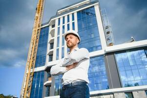 Portrait of an handsome engineer at work photo